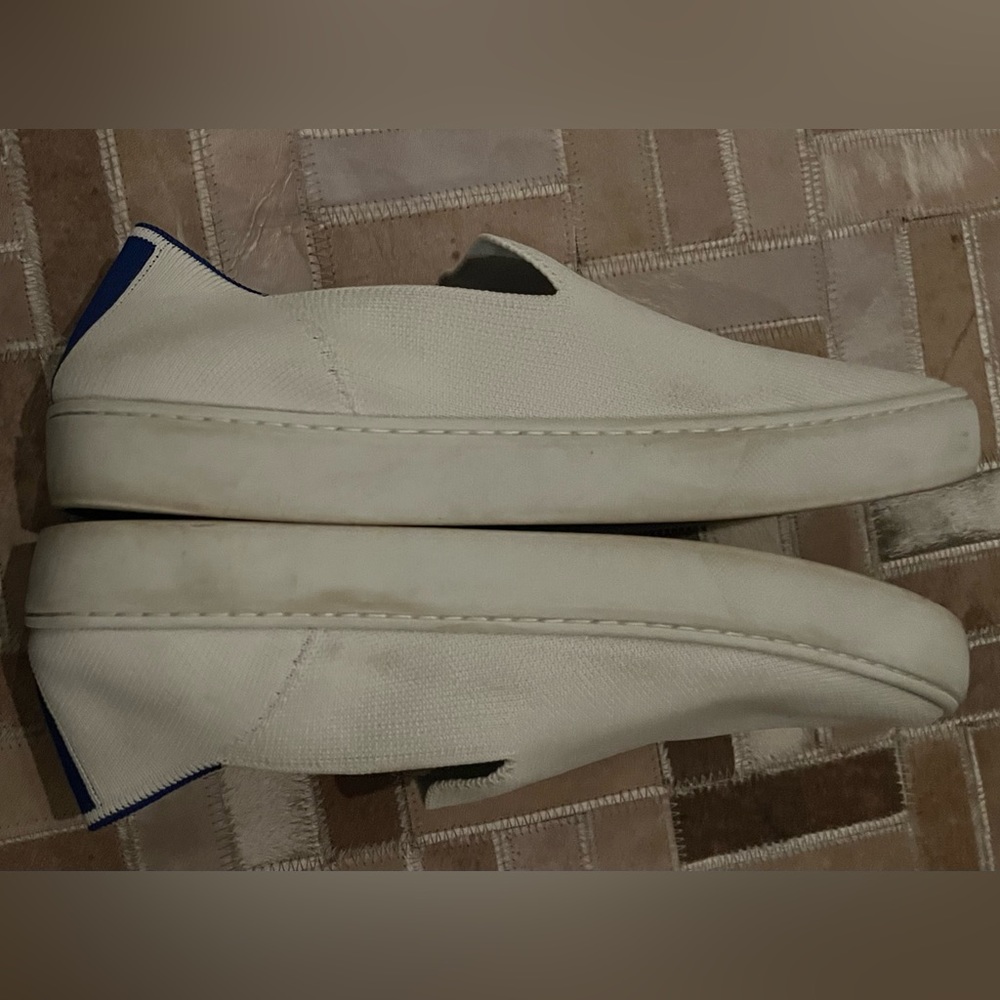white rothy's slip on shoes- size 9.5- signs of wear but no defects